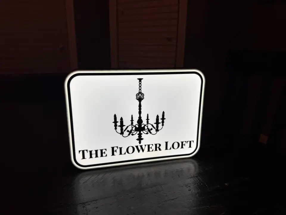 Office logo light box in a workspace display